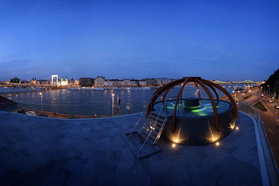 Rudas rooftop hot pool with night view in Budapest
